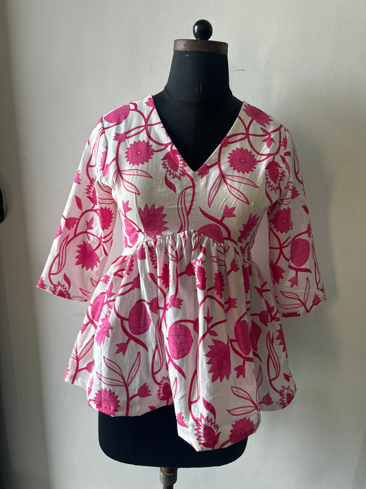 PINK PETAL PEPLUM TOP